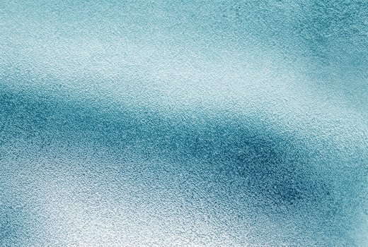 Close-up of Blue Textured Glass Surface photo