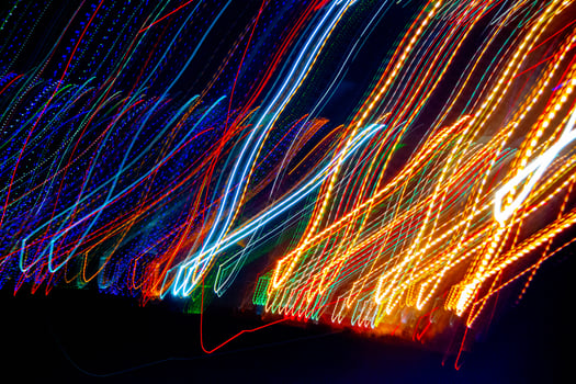 Abstract blurry background with pattern from colorful traces or trajectory of lights photo