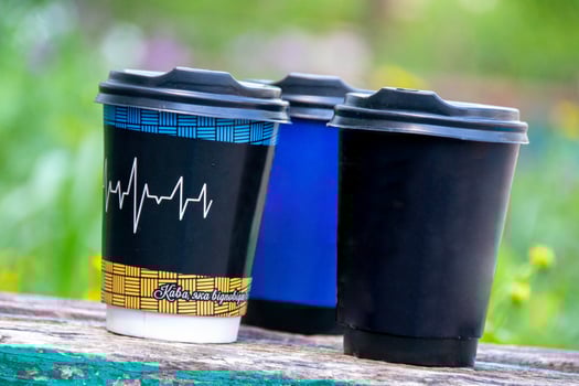 Simply flat design color paper coffee cup on pastel colorful trendy background photo