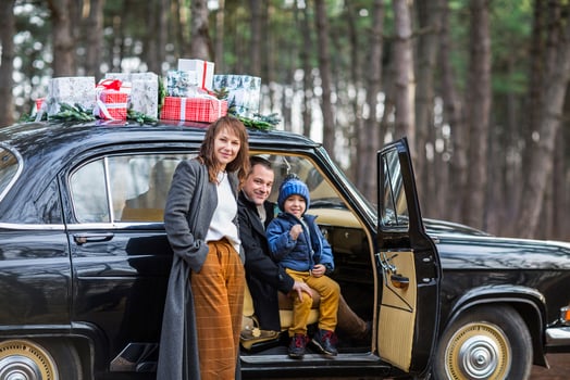 Stylish couple with son in park. Holiday concept photo