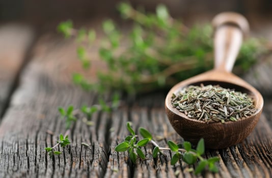 Thyme on Wooden Surface photo