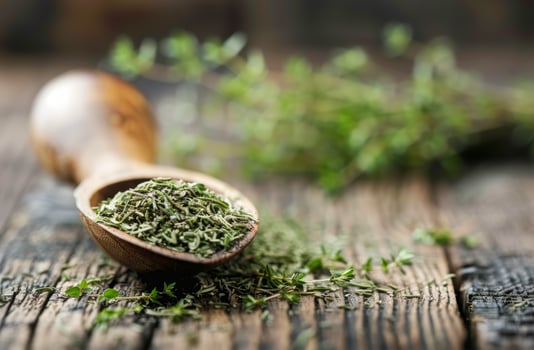Thyme on Wooden Surface photo