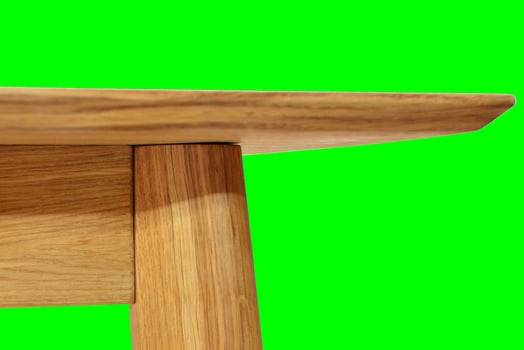 Wooden dinner table surface. Natural wood furniture close view. Tabletop isolated over green screen chroma key background photo