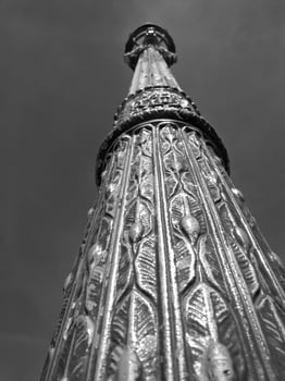 Bronze column in Paris, France. Black and white monochrome photo