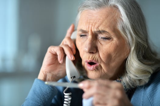 Close up portrait of a sick senior woman photo