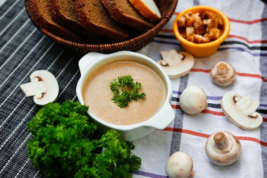 Creamy Mushroom Soup With Parsley and Bread photo