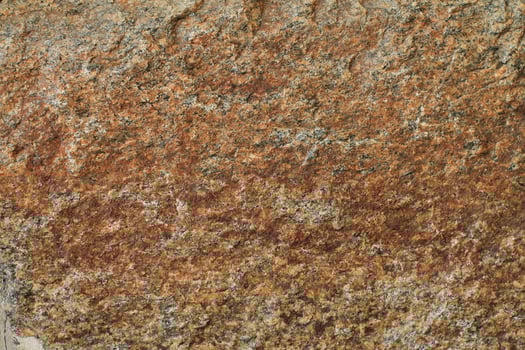 Abstract natural rock stone granite grunge rusty metal texture design background natural color stone material granite design wallpaper. Close-up detail of natural stone photo