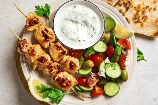 Grilled chicken kebab with vegetable salad photo