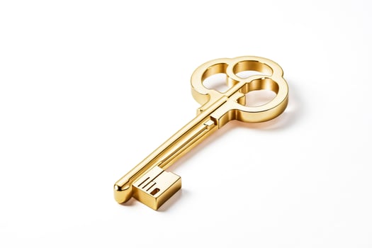 Golden Key on White Background photo