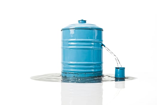 Water Tank Leaking Water on White Background photo