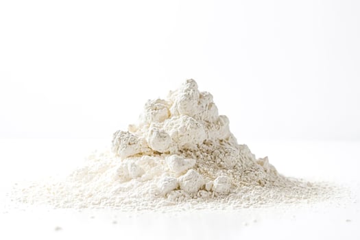 Pile of white powder on white background photo