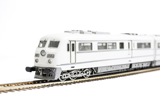 White Model Train on Tracks photo