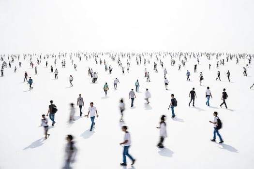Blurred crowd of people walking on a white background photo