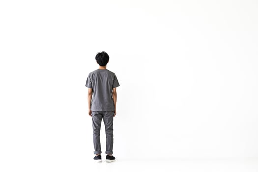 Man Standing With Back To Camera photo