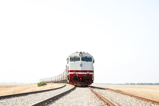 Freight Train on Tracks in the Field photo