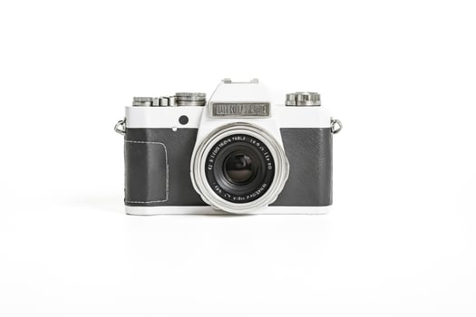 Vintage camera on white background photo