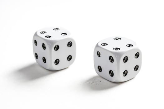 Close Up of Two White Dice on a White Background photo