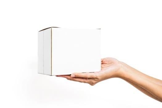 Hand Holding a White Box photo