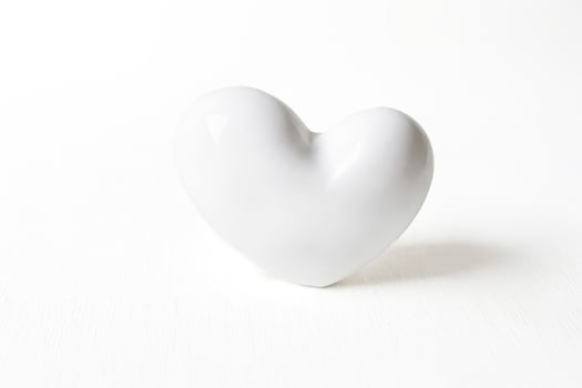 White Heart Shape on White Background photo
