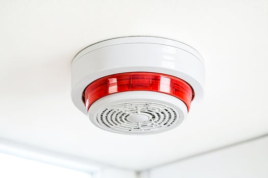 Close Up Of Smoke Detector On Ceiling photo