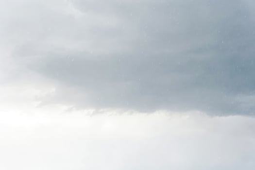 Grey sky with light rain photo