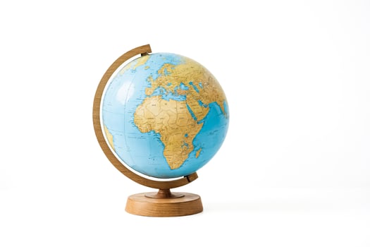 Wooden globe on a white background photo