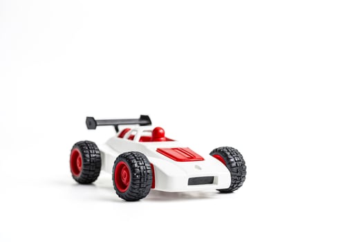 White Toy Race Car Isolated on White Background photo
