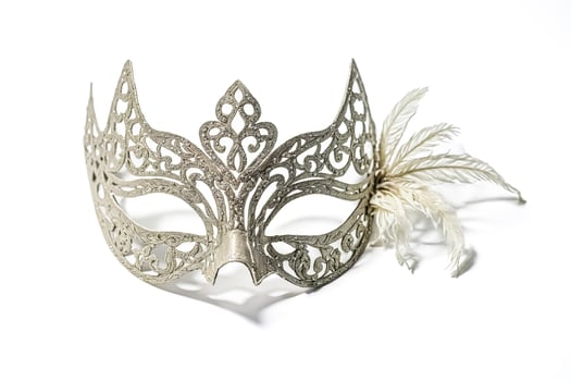 Silver masquerade mask with feather detail photo