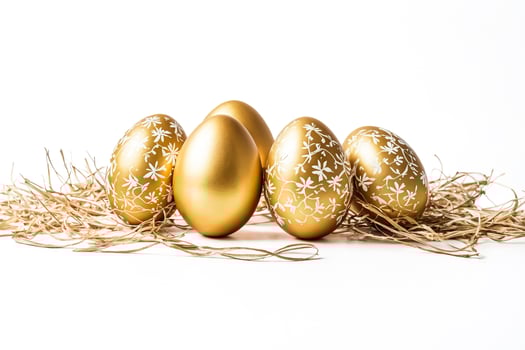 Golden Easter Eggs in a Nest of Straw photo