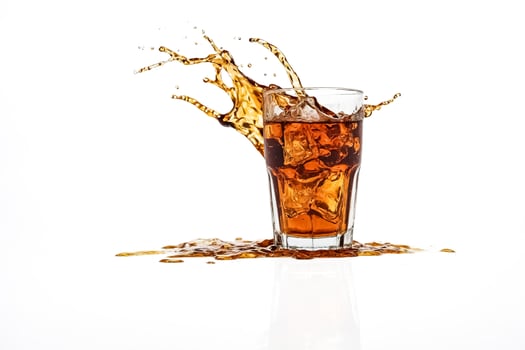 Splashing Iced Tea in Glass photo