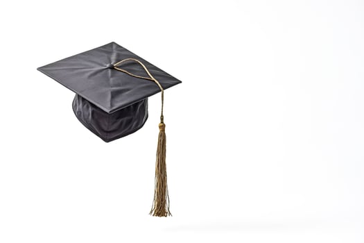 Black Graduation Cap With Gold Tassel photo