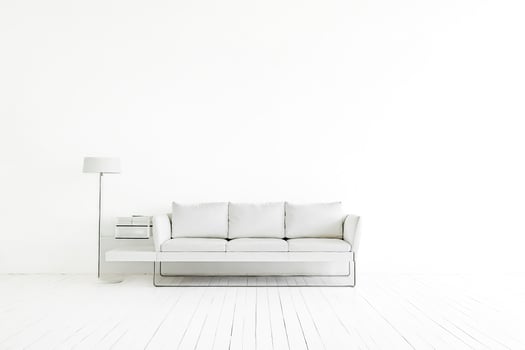 Minimalist White Living Room with Sofa and Lamp photo