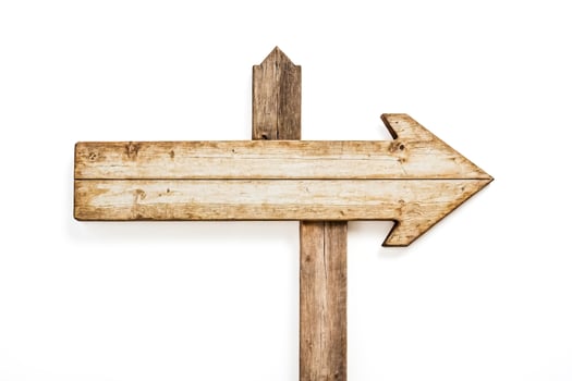 Wooden Arrow Sign Isolated on White Background photo