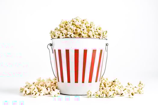Popcorn in a Red and White Striped Bucket photo