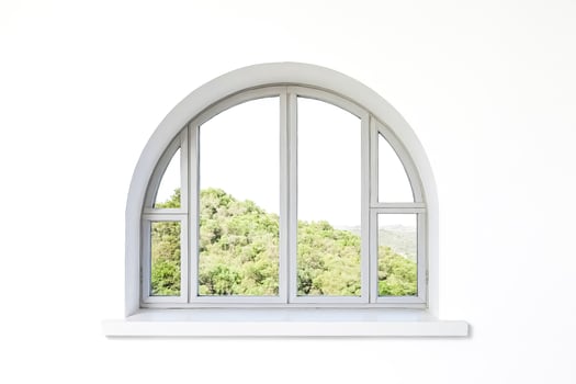 Arched Window with View of Green Trees photo