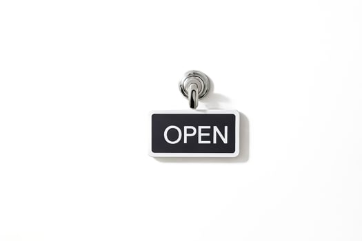Open Sign Hanging on White Door photo