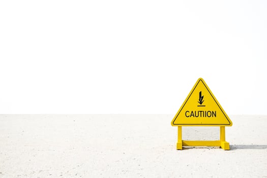 Yellow Caution Sign with Lightning Bolt photo