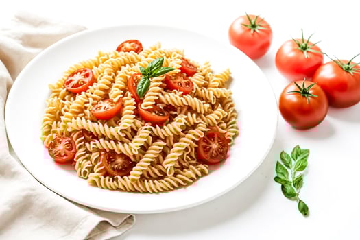 Fresh pasta with tomato and basil photo