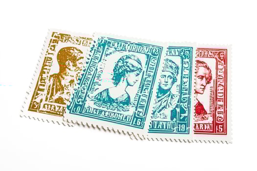 Collection of vintage stamps with different historical figures photo