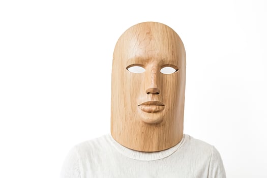 Wooden Mask on White Background photo