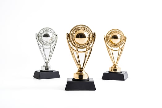 Gold and Silver Trophies on White Background photo