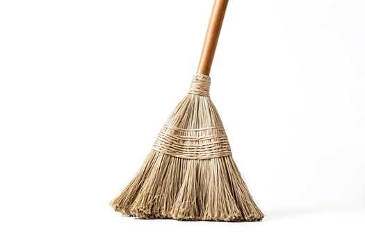Closeup of a Traditional Broom with Wooden Handle photo