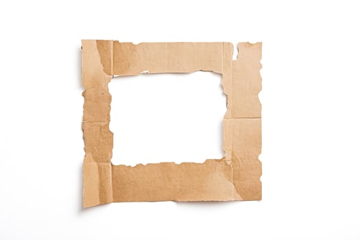 Torn Cardboard Frame on White Background photo