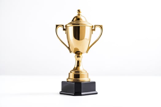 Gold trophy on white background photo