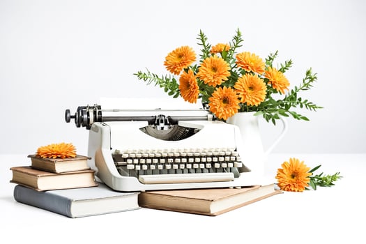 Vintage Typewriter with Flowers and Books photo