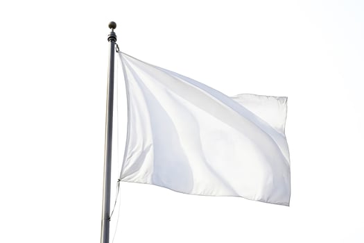 White flag waving in the wind photo
