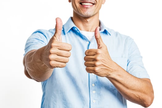 Man giving thumbs up with both hands photo