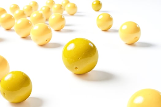 Yellow Balls on White Background photo