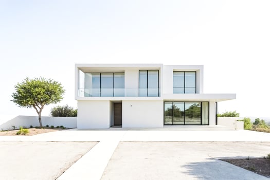 Minimalist Modern White House with Large Windows photo