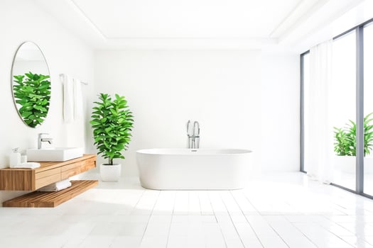 Minimalist Bathroom Interior with White Bathtub and Green Plants photo